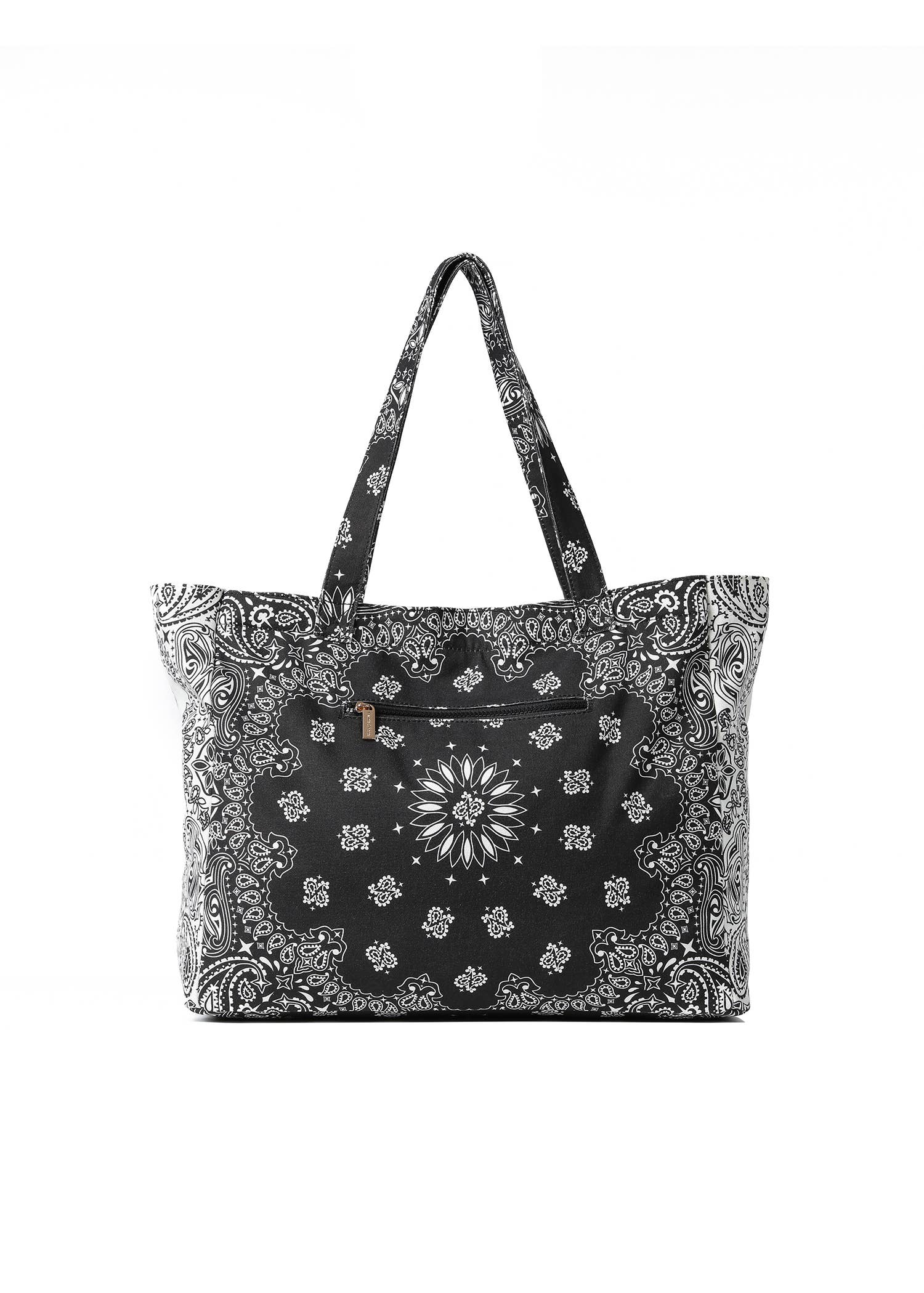 A black tote bag with a white paisley and floral bandana print, featuring dual shoulder straps and a front zippered pocket.
