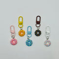 Sprinkle Donut charms in strawberry, sunshine yellow, blueberry, chocolate and vanilla with matching swivel clasps